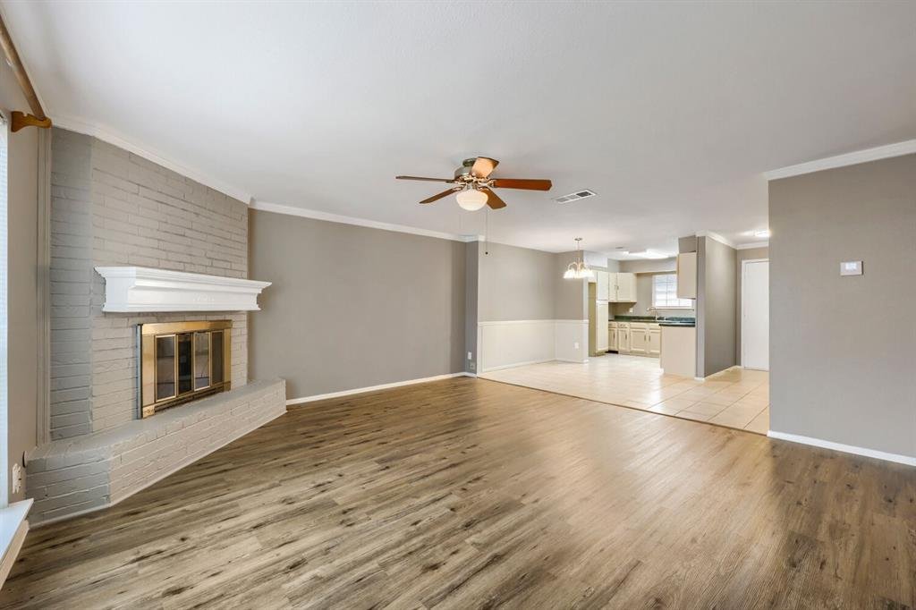 18 x 16 living room open to the dining area and kitchen at 22 E Townhouse Ln #31, Grand Prairie