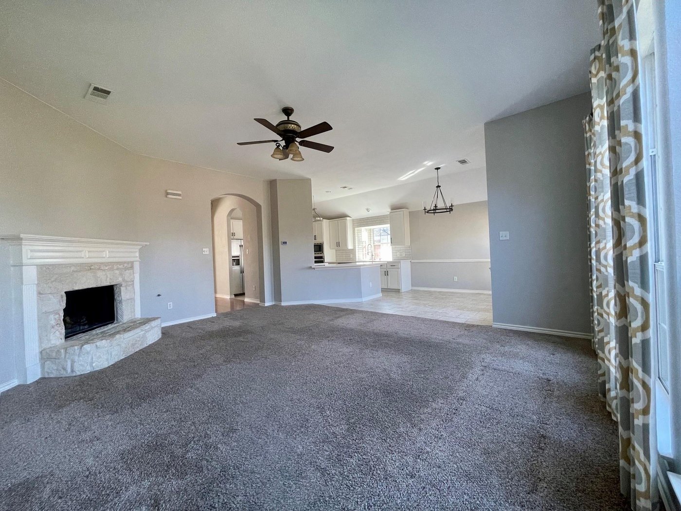 Living room with brick fireplace at 6505 Josephine Dr, Arlington