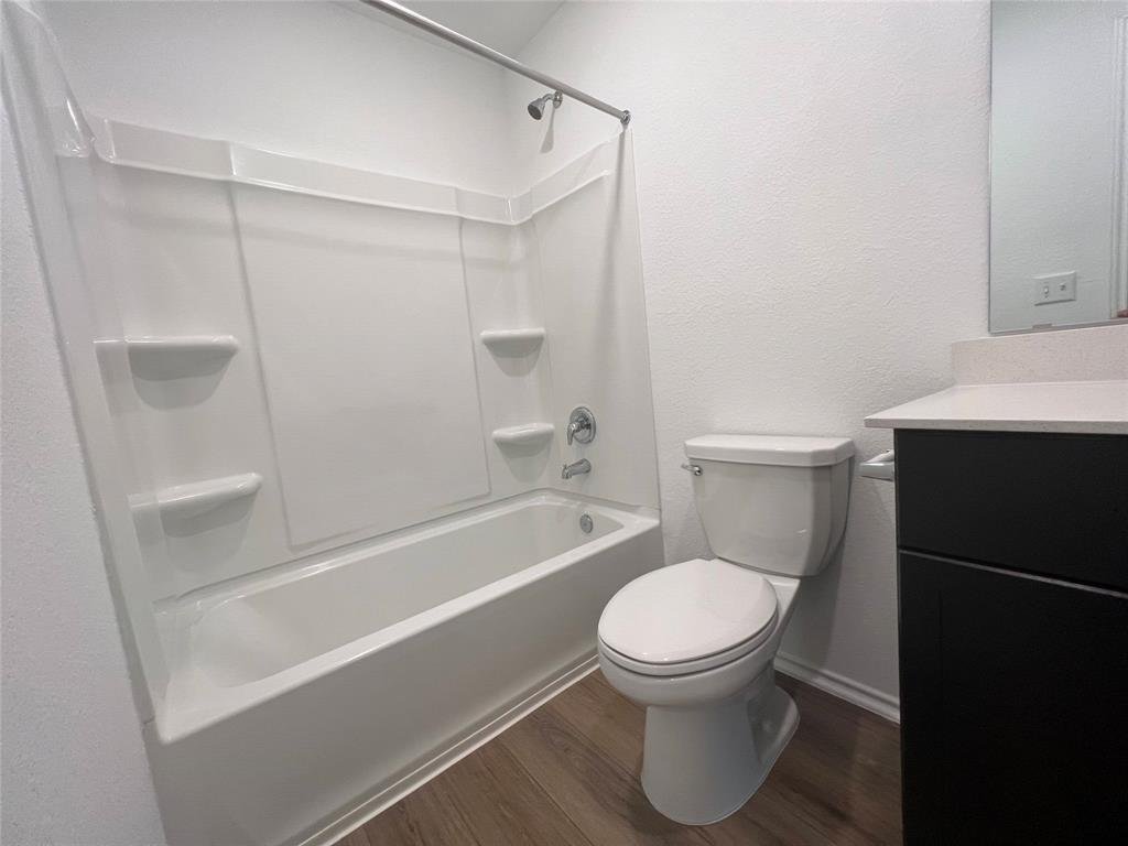 Second full bathroom with tub and shower at 7224 Spotted Leaf Way in Del Valle