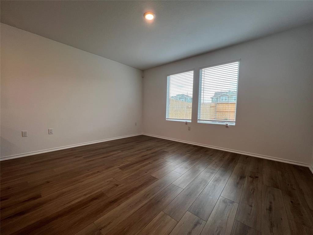 Dining area on the open main floor at 7224 Spotted Leaf Way, Del Valle