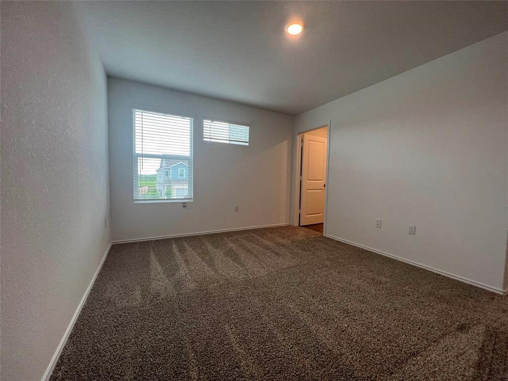 Primary suite upstairs at 7224 Spotted Leaf Way, Del Valle TX