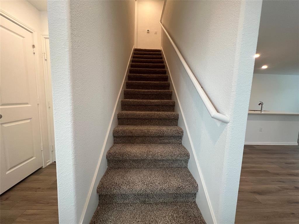 Staircase to the second floor bedrooms at 7224 Spotted Leaf Way, Del Valle